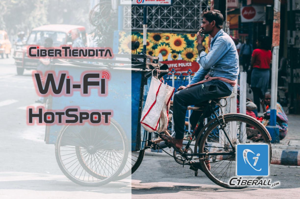 Wi-Fi HotSpot comunitario de CiberALL en una calle con comercio local